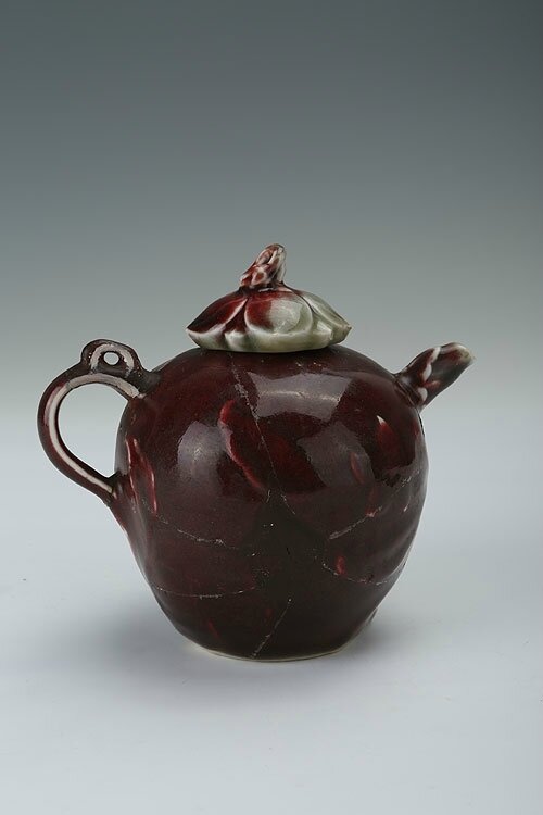 Red-glazed peach-shaped water dropper, Xuande period(1426-1435)