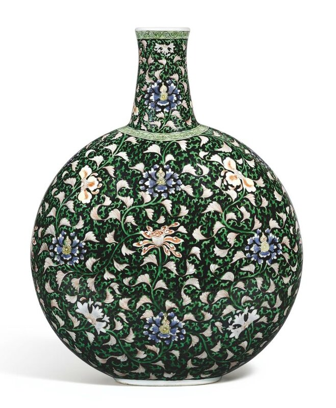 A fine and rare famille-noire 'floral scroll' moonflask, Qing dynasty, Yongzheng period