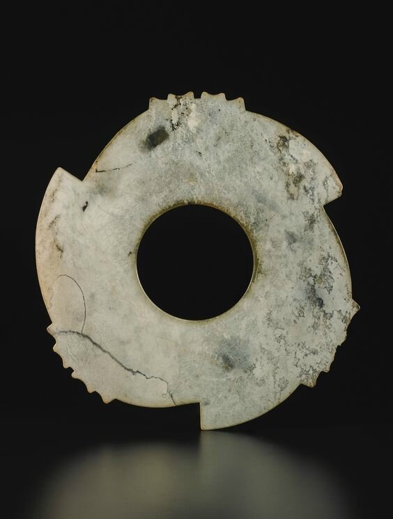 An exceptionally large jade notched disc (xuanji), Late Neolithic period-Shang dynasty