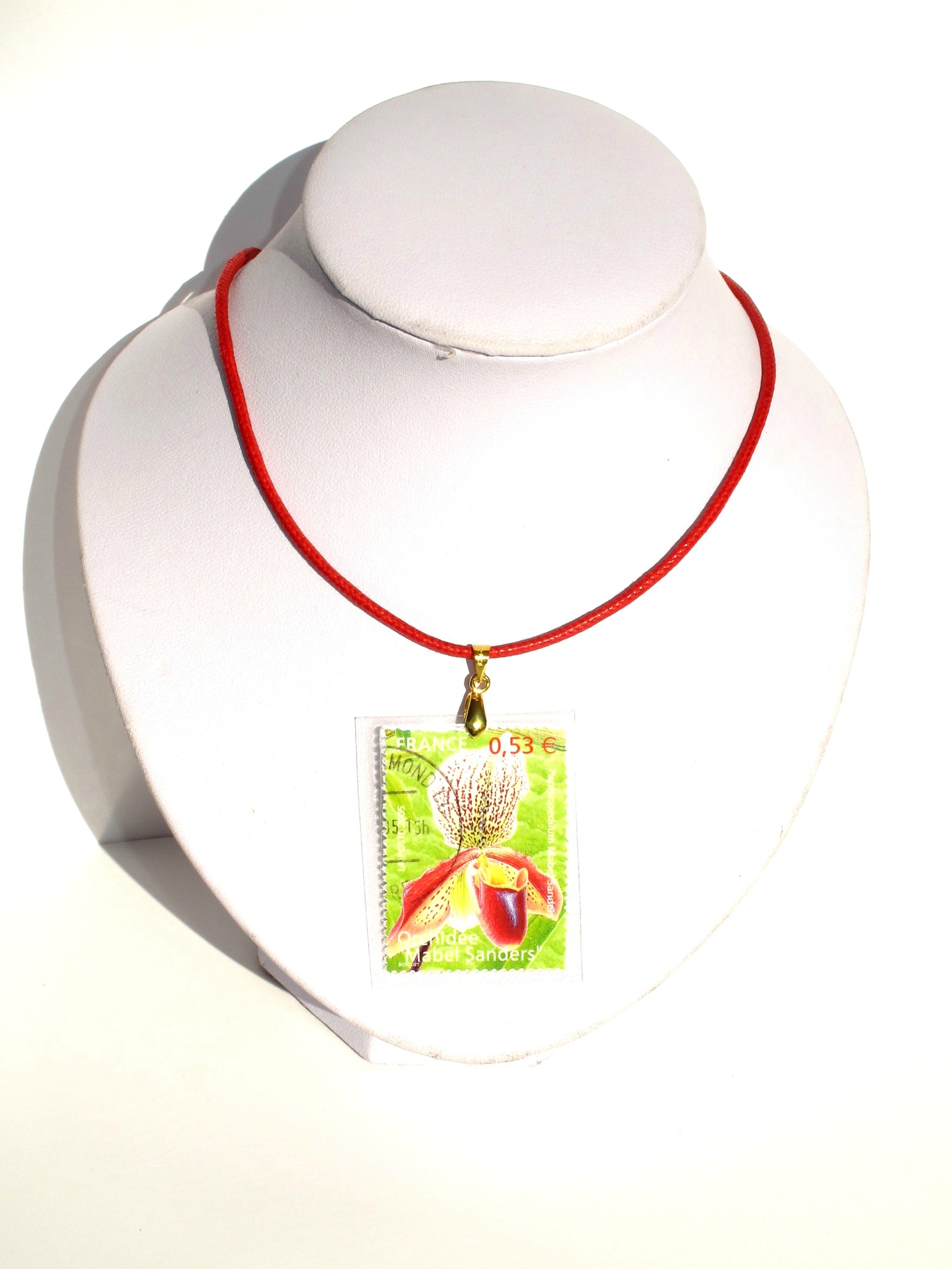 pendentif timbre orchidée rouge et verte