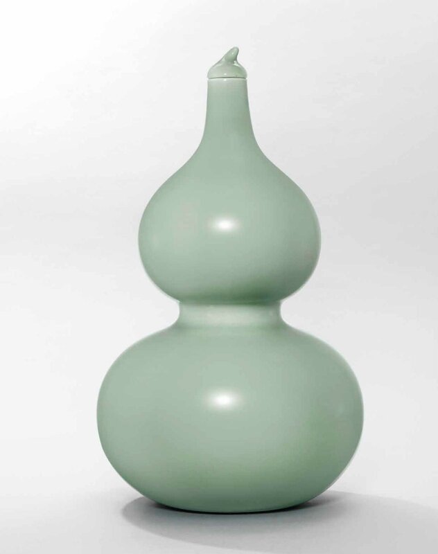 A fine and very rare celadon-glazed double-gourd vase and cover, Qianlong six-character seal mark in underglaze blue and of the period (1736-1795)