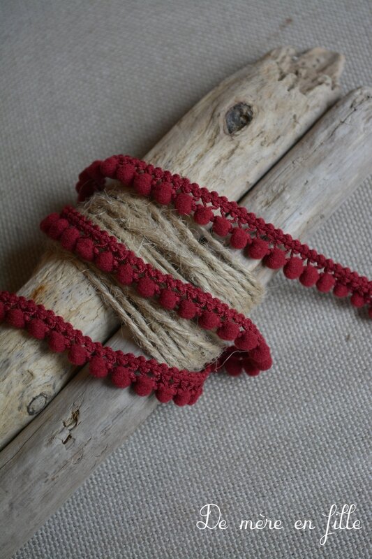 pompon décroché bordeaux