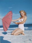 1949_tobey_beach_by_dedienes_umbrella_red_071_1