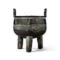 An inscribed archaic bronze ritual food vessel (ding), late shang-early western zhou dynasty