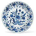 A ming-style blue and white 'lotus bouquet' dish, 18th century