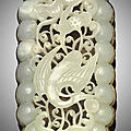 A pale greenish-white jade openwork plaque, ming dynasty (1368-1644)