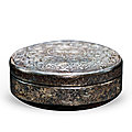 A silver 'floral scrolls' box and cover, tang dynasty (618-907)