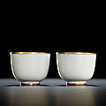 A fine pair of small white-glazed wine cups, marks and period of kangxi (1662-1722)