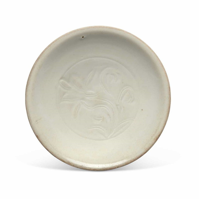 A small carved Ding 'lotus' dish, Northern Song dynasty (960-1127)