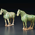 A pair of small green and straw-glazed pottery figures of horses, tang dynasty (ad 618-907)