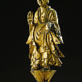 An important gilt-bronze figure of buddha, northern wei dynasty (386-534)