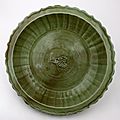Dish. porcelain with impressed decoration and celadon glaze. longquan ware. yuan dynasty, about ad 1300–1368