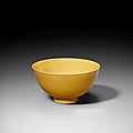 A yellow-glazed 'medallions’ bowl, kangxi six-character mark in underglaze blue within a double circle and of the period (1662-1