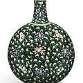 A fine and rare famille-noire 'floral scroll' moonflask, qing dynasty, yongzheng period