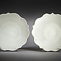 A fine pair of white-glazed five-petalled foliate dishes, Five Dynasties, circa 10th century