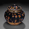 A small Cizhou-type russet-splashed black-brown-glazed jar and a cover, Jin dynasty (1115-1234)