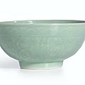 A fine carved celadon-glazed bowl, seal mark and period of yongzheng