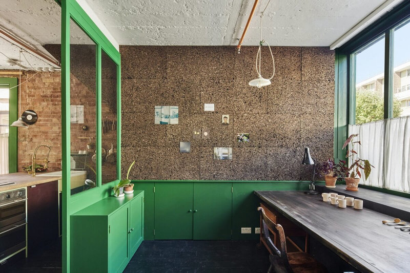 studio-space-brick-walls-deep-brunswick-green-cabinets-nordroom