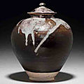 A phosphatic glaze-splashed brown-glazed stoneware jar and cover, Tang dynasty (618-907) 