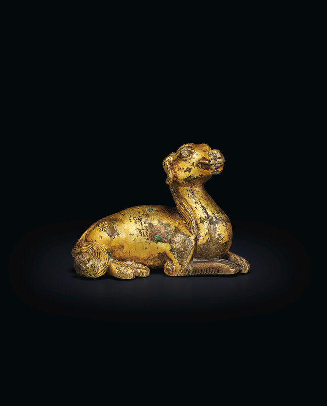 2020_NYR_19039_0919_000(a_small_gilt-bronze_figure_of_a_recumbent_hound_china_17th_century_or032725)
