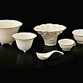 Five blanc de chine porcelain cups and a spoon, china, qing dynasty, kangxi period (1662 - 1722)