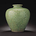 A rare carved and moulded longquan celadon baluster jar, ming dynasty, 15th century