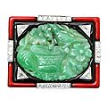 Carved jade enamel and diamond art deco brooch