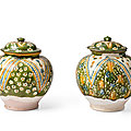 Two similar sancai and blue-glazed globular jars and covers, Tang Dynasty (618-907)