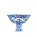 A very rare incised blue and white 'dragon' stem bowl, seal mark and period of qianlong (1736-1795)
