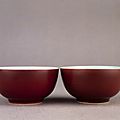 Pair of porcelain tea-bowls with copper-red glaze, yongzheng mark and period (1723-1765)