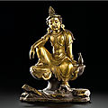 A gilt-bronze figure of 'water-moon' avalokiteshvara, ming dynasty, 17th century