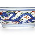 A small wucai 'Dragon and Phoenix' cup, Mark and period of Wanli