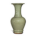 A carved ‘longquan’ celadon-glazed 'floral' vase, ming dynasty