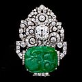An art deco jadeite jade and diamond brooch by mauboussin