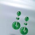 Fine pair of jadeite 'discs', jadeite and diamond pendent earrings