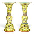 A pair of large famille-rose yellow-ground 'bajixiang' altar vases, gu, qianlong marks and period (1736-1795)