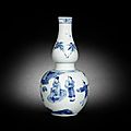 A blue and white double-gourd vase. circa 1640-1650