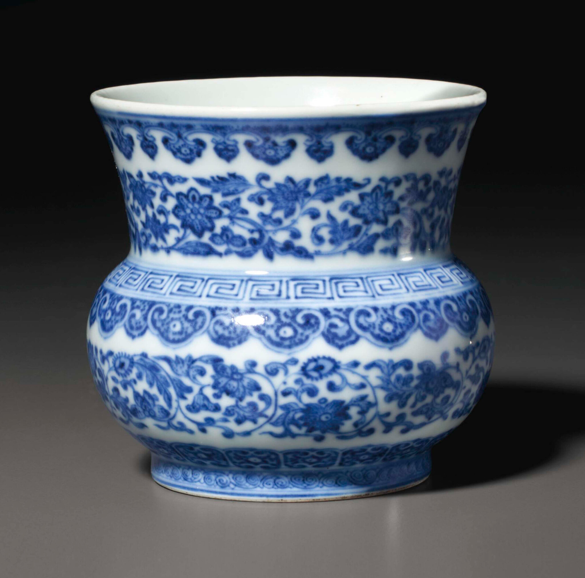 A rare blue and white 'flower scroll' zhadou, Qianlong six-character ...