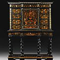 A pewter, brass, fruitwood and stained sycamore inlaid marquetry, ebony and ebonised cabinet on stand attributed to pierre gole 