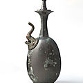 A rare silvery bronze kundika and cover, sui-early tang dynasty, 7th century