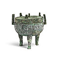 A rare archaic bronze tripod ritual food vessel and cover, ding, middle western zhou dynasty