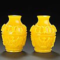 A pair of yellow glass miniature vases. Qianlong mark. Photo Bonhams
